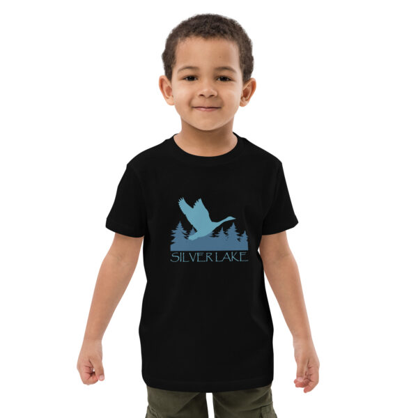 organic cotton kids t shirt black front with a stylized teal blue logo for 'History of Silver Lake' book: A single goose flying over Silver Lake with trees in the background.