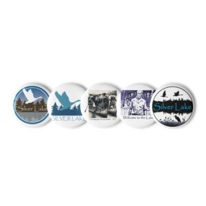 set of pin buttons white 1.25 front with this delightful set of pin buttons capturing iconic moments from 'The History of Silver Lake.' From the daring feat of canoeing a horse across the Susquehanna River to the warm welcome extended by Pappy and his companions, each image embodies the rich tapestry of stories woven throughout Silver Lake's history.