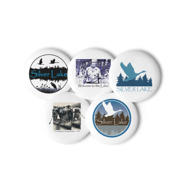 set of pin buttons white 2.25 front with this delightful set of pin buttons capturing iconic moments from 'The History of Silver Lake.' From the daring feat of canoeing a horse across the Susquehanna River to the warm welcome extended by Pappy and his companions, each image embodies the rich tapestry of stories woven throughout Silver Lake's history.