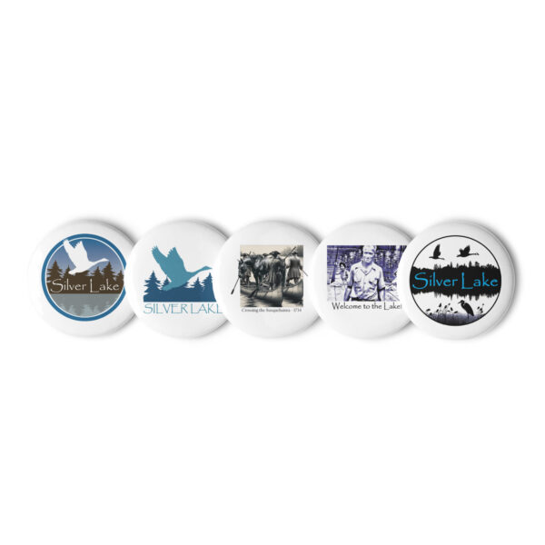 set of pin buttons white 2.25 front with this delightful set of pin buttons capturing iconic moments from 'The History of Silver Lake.' From the daring feat of canoeing a horse across the Susquehanna River to the warm welcome extended by Pappy and his companions, each image embodies the rich tapestry of stories woven throughout Silver Lake's history.