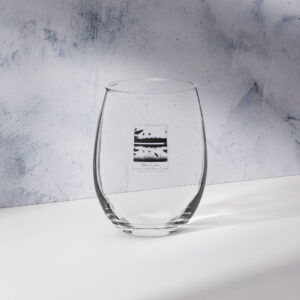 stemless wine glass 15 oz front with an image of Silver Lake featuring a blue heron in the foreground and Canada Geese in flight overhead, highlighting Silver Lake as a waypoint on the American Atlantic Flyway from historyofsilverlake.com website.