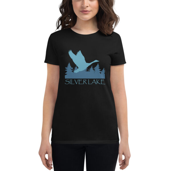 womens fashion fit t shirt black front with a stylized teal blue logo for 'History of Silver Lake' book: A single goose flying over Silver Lake with trees in the background.